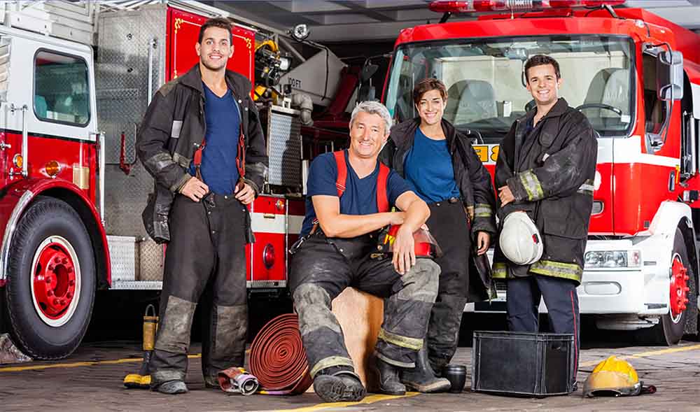 A Group of Happy Firefighters A Group of Happy Firefighters