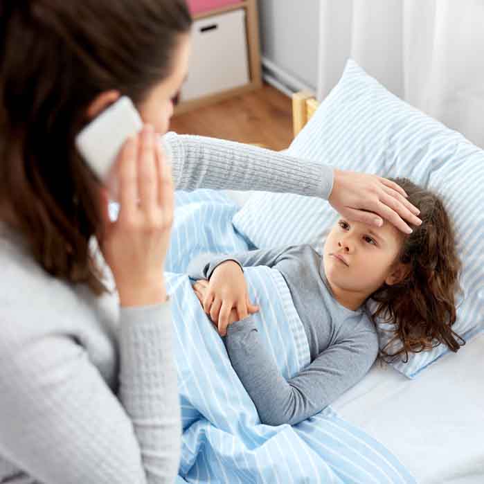 A Mother Checking Her Daughters Fever A Mother Checking Her Daughters Fever