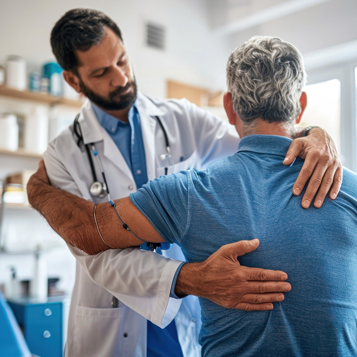 Doctor Inspecting a Patients Back Doctor Inspecting a Patients Back