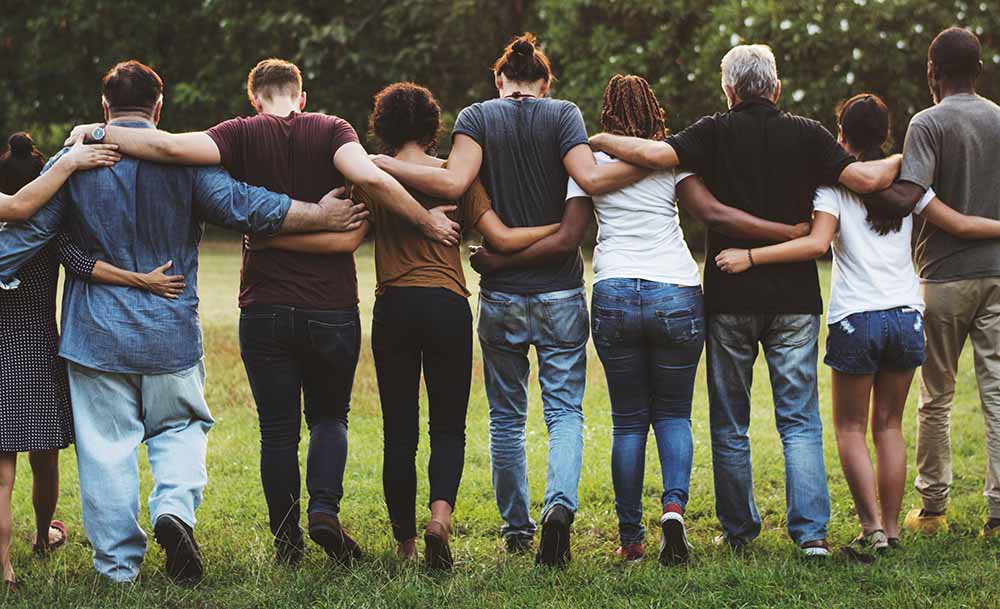 The Hometown Difference - Group of People With Arms Around Each Other The Hometown Difference - Group of People With Arms Around Each Other