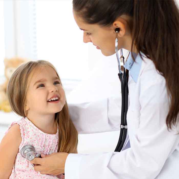 doctor checking a little girls heartbeat doctor checking a little girls heartbeat